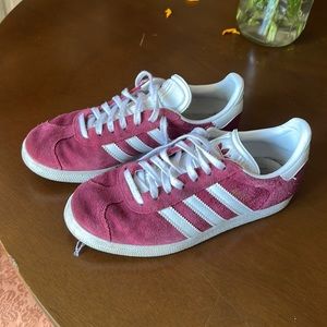 Maroon suede Adidas Gazelle sneakers